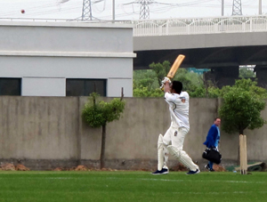 Mikson Pathi hits a boundary